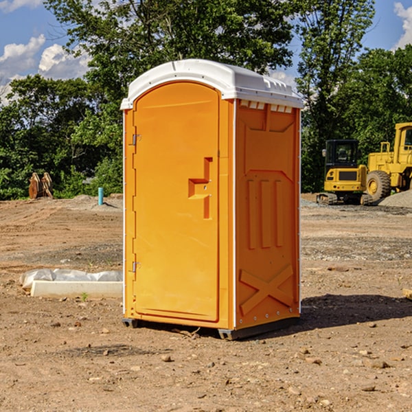 what is the cost difference between standard and deluxe portable restroom rentals in Moon